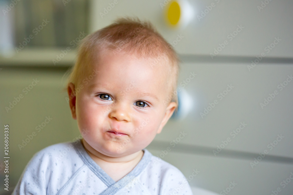 Image of sweet baby boy, closeup portrait of child, cute toddler with blue eyes Image of sweet baby boy, closeup portrait of child, cute toddler with blue eyes