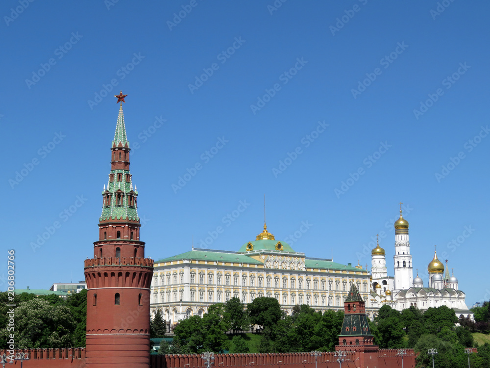 Moscow Kremlin in summer. The Vodovzvodnaya tower, Grand Kremlin Palace and Ivan the Great Bell tower
