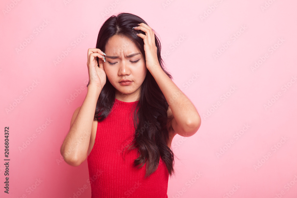 Young Asian woman got sick and  headache.