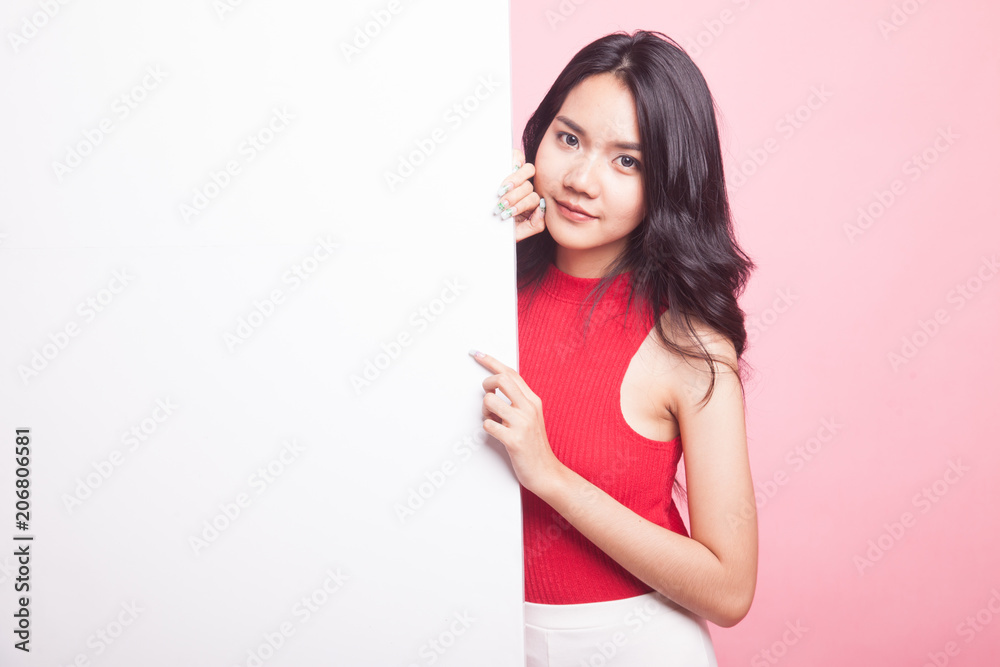 Young Asian woman with blank sign. Young Asian woman with blank sign.