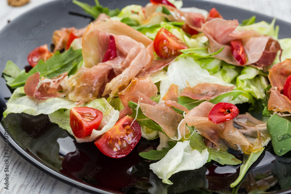 Fresh vegetable salad with prosciutto Fresh vegetable salad with prosciutto