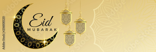 eid mubarak banner with hanging lantern and text space photo