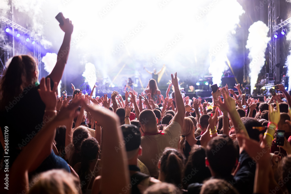 Portrait of happy crowd enjoying at music festival Portrait of happy crowd enjoying at music festival