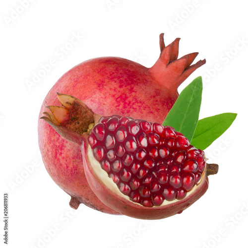 pomegranate with leaves and slice isolated on white background