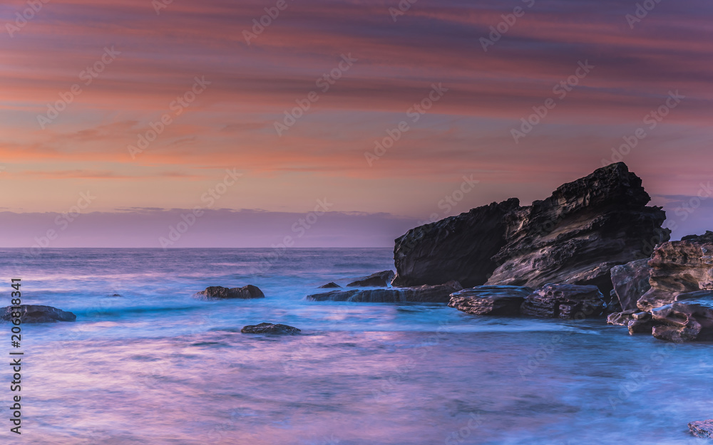 Sunrise Seascape and Rocky Outcrop