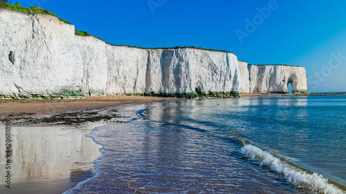 View of white chalk cliffs and beach in Kingsgate Bay, Margate, East Kent, UK photo