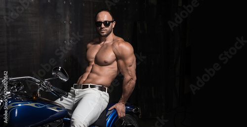 Sexy young handsome muscular biker 