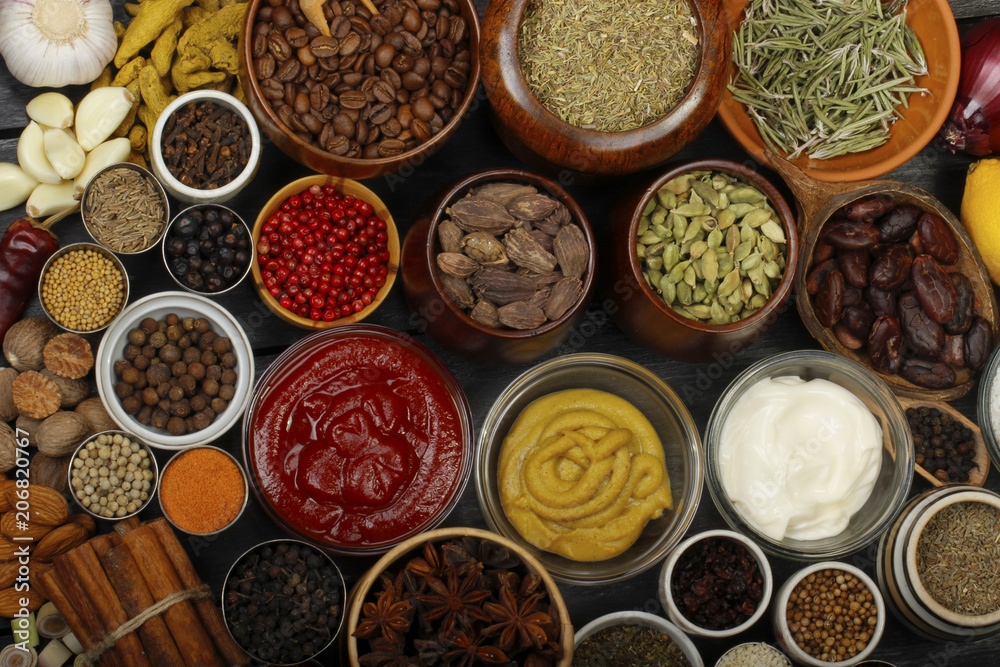 different spices on wooden background. top view different spices on wooden background. top view