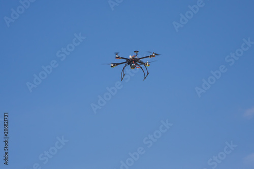 quadcopter drone for hobby on clear blue sky background
