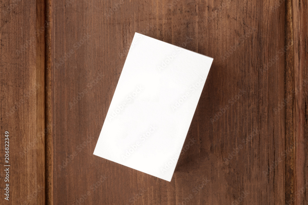 White business card mockup on a dark background, overhead photo with copy space White business card mockup on a dark background, overhead photo with copy space