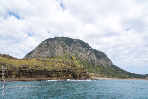 Sanbang Mountain and ocean in Jeju Island, South Korea. photo