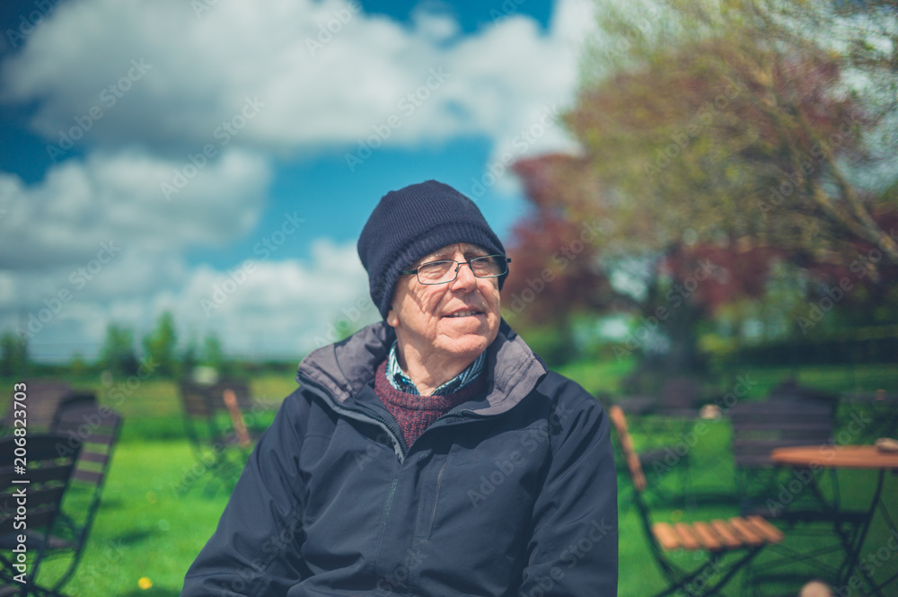 Senior man outdoors in garden