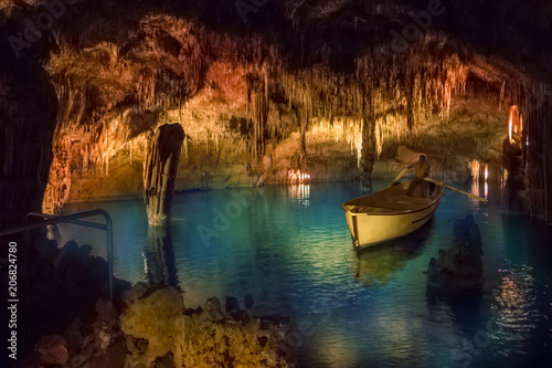 Drach Cave, Mallorca, Spain, geological wonders, underground formations and mineral-rich caverns with a blue lake reflections as a subterranean beauty. photo