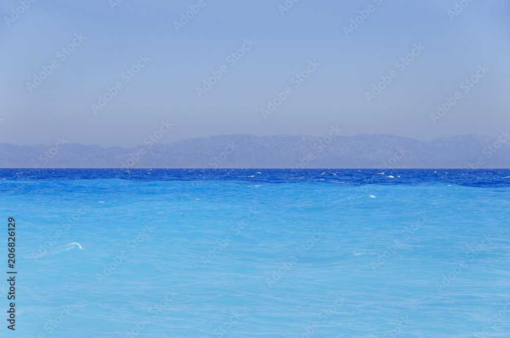 Obraz premium Tropical blue turquoise harmony sea gentle waves at the coast