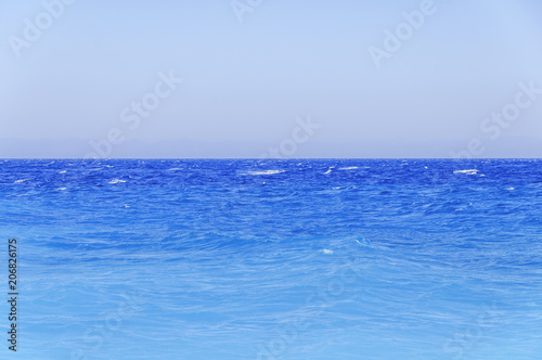 Turquoise harmony sea gentle waves at the coast