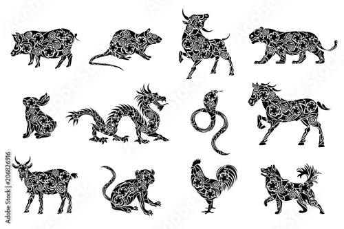 Set of all 12 zodiac animals for Chinese New Year celebration design. Vector illustrations in paper cut style.