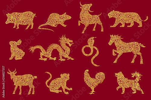 Set of all 12 zodiac animals for Chinese New Year celebration design. Vector illustrations in paper cut style.