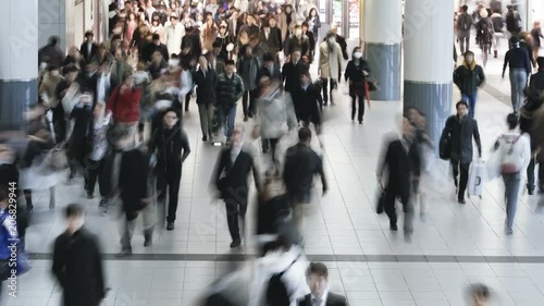 Commuters walking through Shibuya Station at rush hour, Shibuya, Tokyo, Honshu, Japan, Asia, T/Lapse