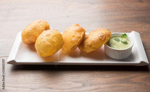 Homemade Fried Puri or Poori Or Indian Bread, selective focus photo