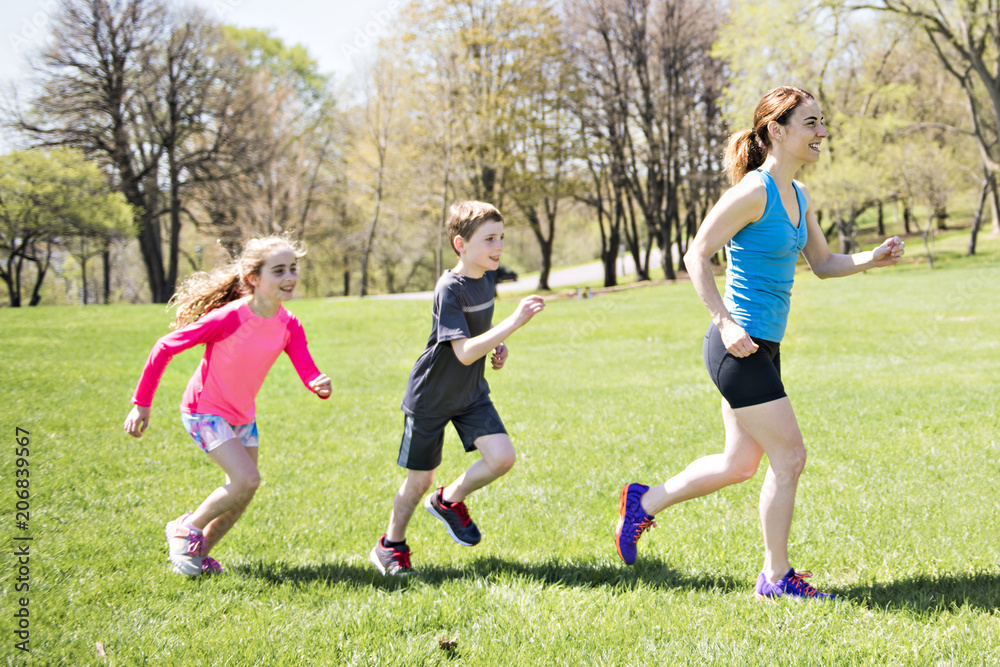 Parents with children sport running together outside Parents with children sport running together outside