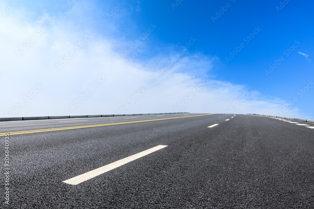 new asphalt road and sky clouds new asphalt road and sky clouds