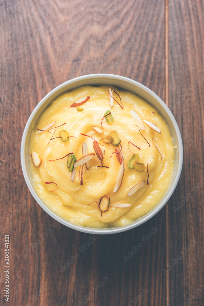 Shrikhand OR Srikhand is an Indian dessert made of strained yogurt, garnished with dry fruits and saffron. Shrikhand OR Srikhand is an Indian dessert made of strained yogurt, garnished with dry fruits and saffron.