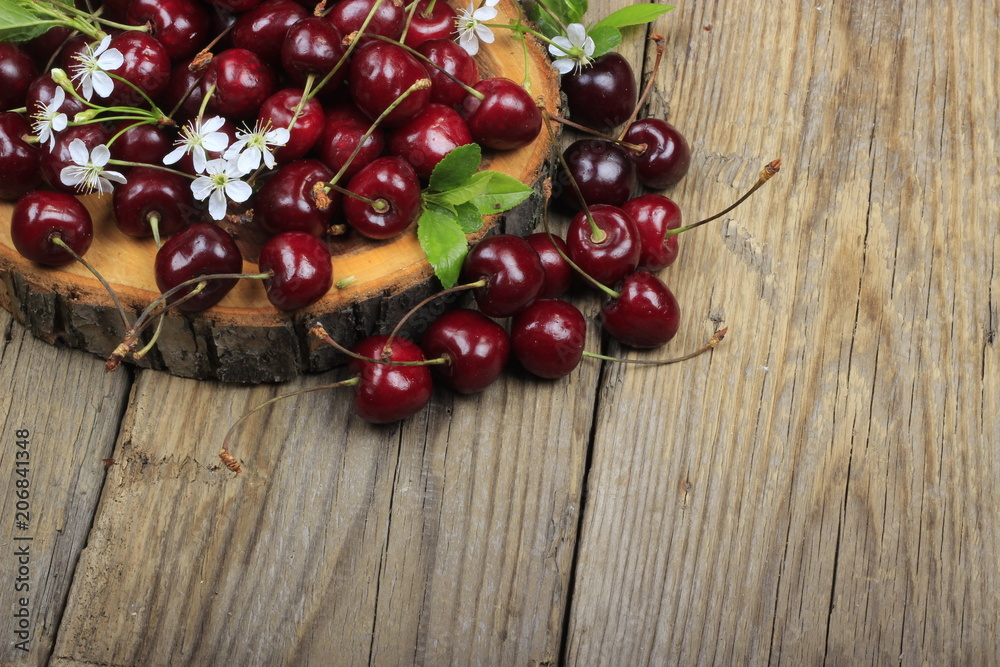 heap of cherry on wooden background heap of cherry on wooden background