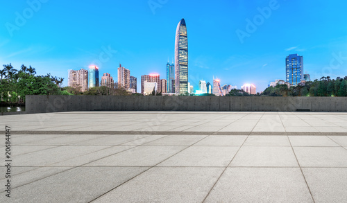 empty square floors and modern city skyline in Shenzhen at night,China