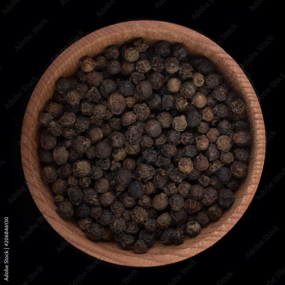 black peppercorn isolated on black. top view black peppercorn isolated on black. top view