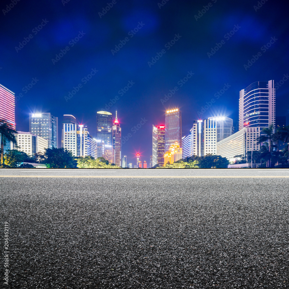 Obraz premium street and skyscrapers of a modern city at night