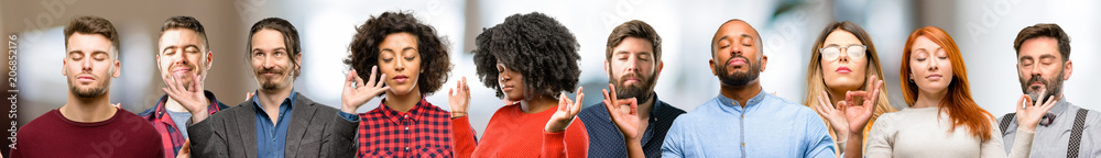 Obraz premium Group of people doing ok sign gesture with both hands expressing meditation and relaxation