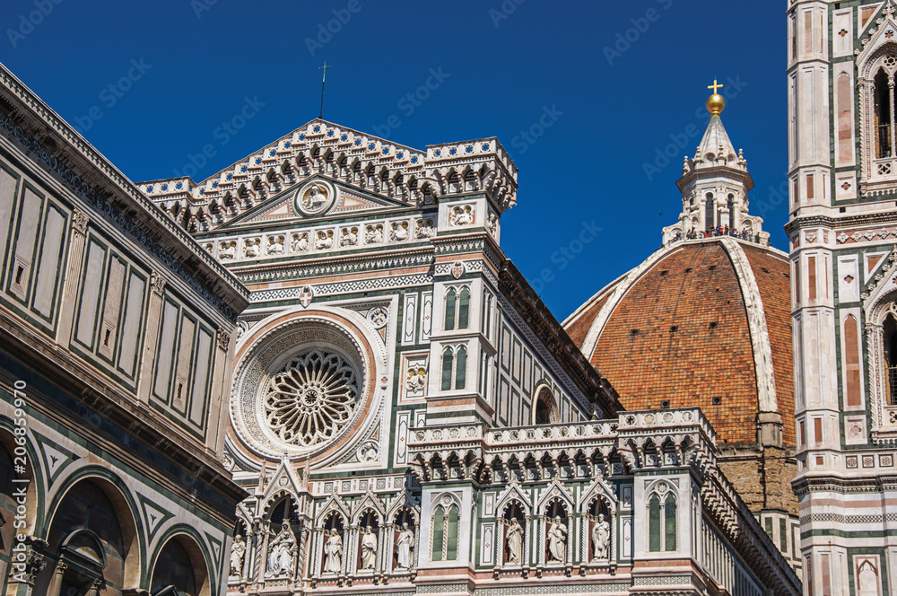 Close-up of the dome of the Santa Maria del Fiore Cathedral and Giotto's Campanile (bell tower). In the town of Florence, the famous and amazing capital of the Italian Renaissance. Tuscany region