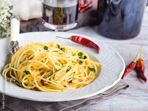 Spaghetti with spicy red pepper, garlic, olive oil. Traditional Italian pasta dish