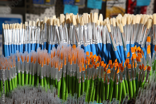 Various paintbrushes collection. School supplies, stationery accessories. Colorful stationery. Stationery store