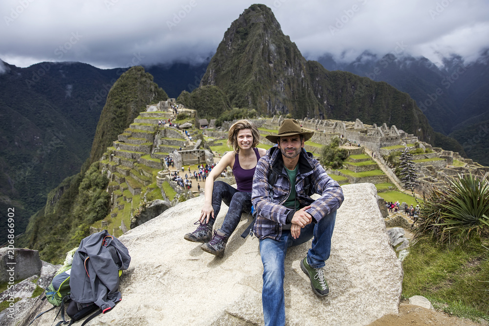 Fototapeta premium Young couple at Machu Picchu in Peru