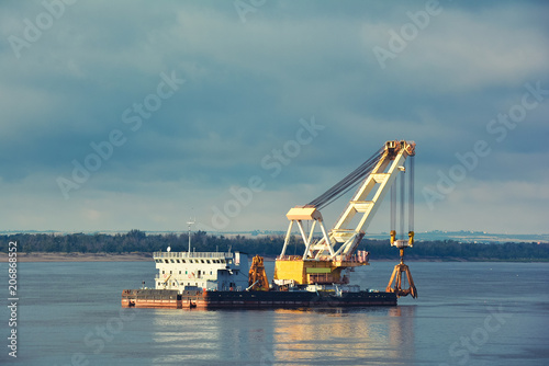 Barge crane on the river