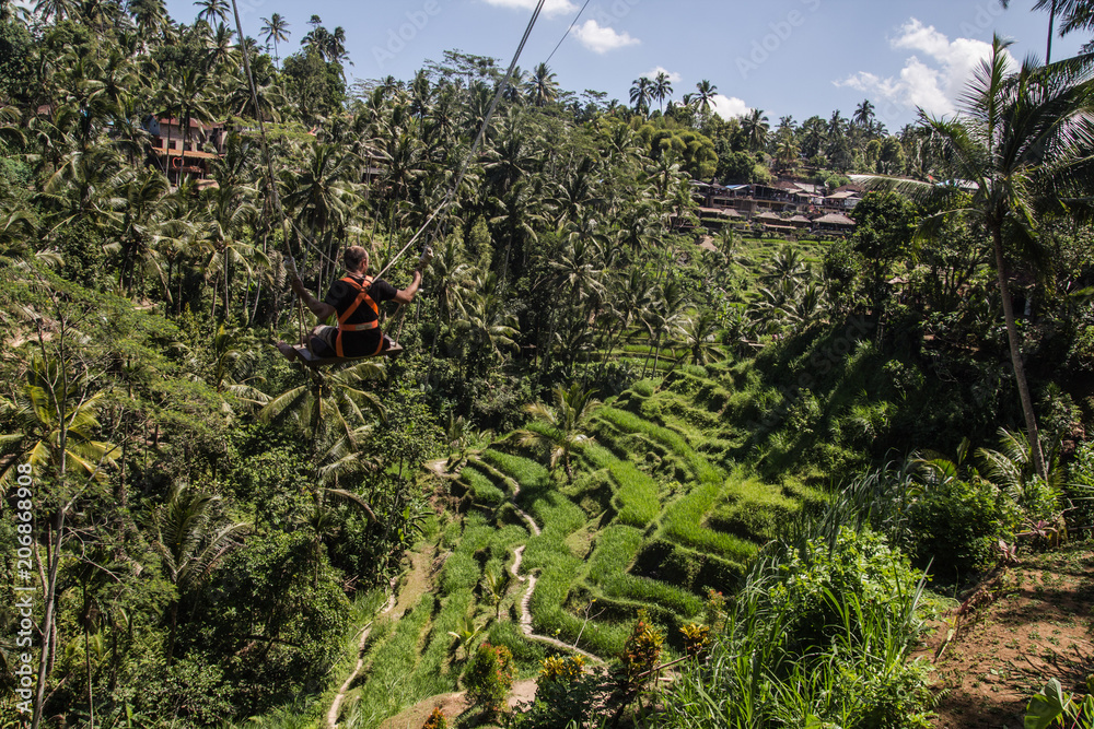 Swing over Tegallalang ricefields in central Bali