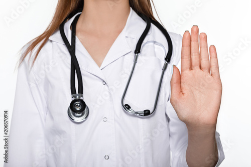 doctor showing stop gesture