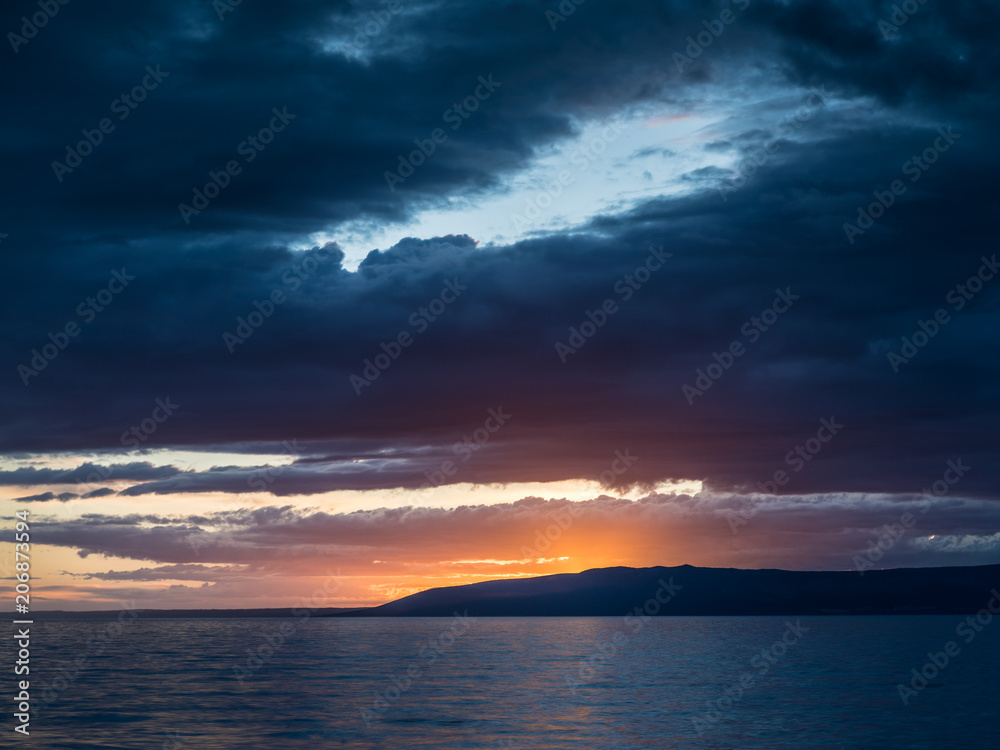 Dramatic sunset with dark clouds in Istria