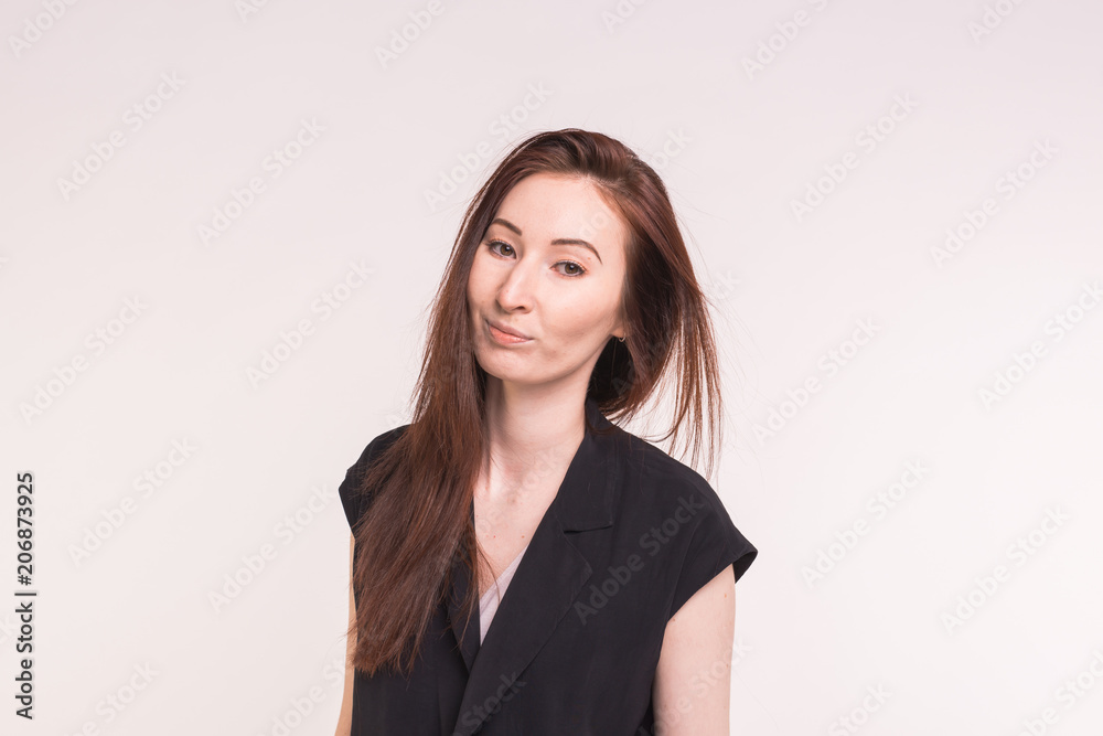 Young Asian pretty woman close up portrait on white background. Young Asian pretty woman close up portrait on white background.