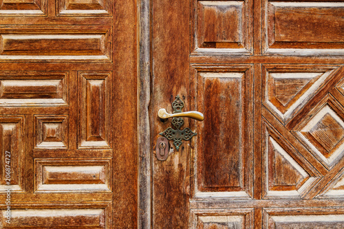 Detail of a door with arab style carvings at Emir Bachir Chahabi Palace Beit ed-Dine in mount Lebanon Middle east, Lebanon photo