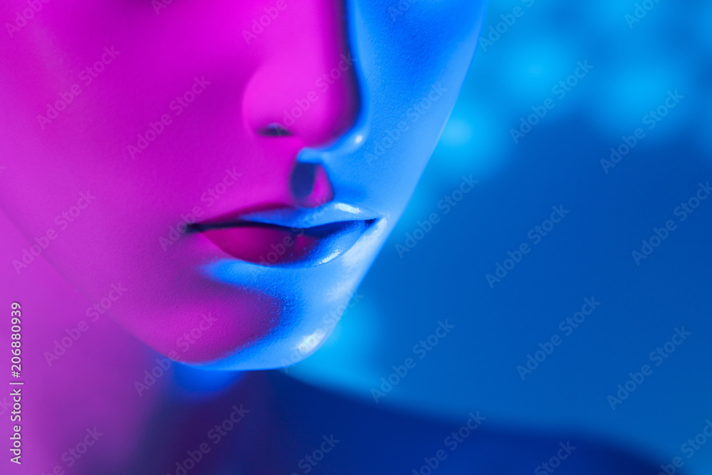 Naklejka premium Lips of the dummy. Dummy in purple. Nose and lips.