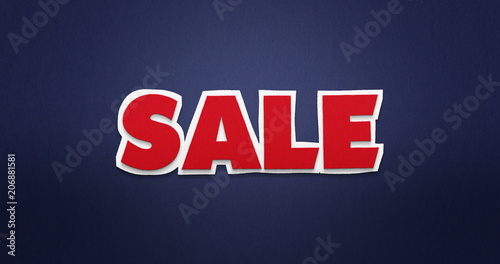 Sale. Red word on blue background with paper texture.