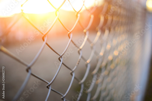 Obraz na płótnie fence with metal grid in perspective w salonie