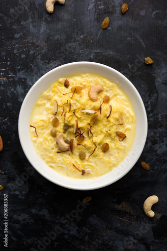 Rice pudding OR Kheer from India called also called Firnee. served in a bowl. Selective focus photo