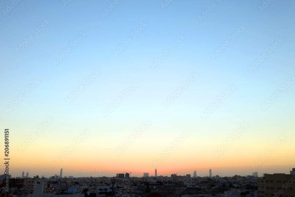 Sunset scene with buildings silhouette in countryside of Jeddah, Saudi arabia