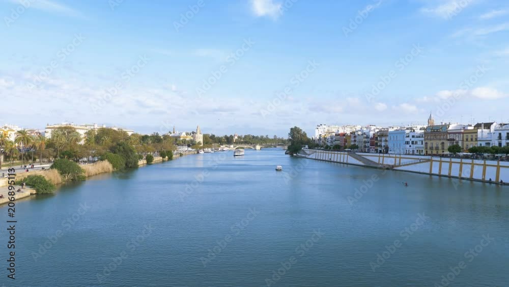 Suggestive View of Canal on Guadalquivir river in Sevilla, Spain Suggestive View of Canal on Guadalquivir river in Sevilla, Spain