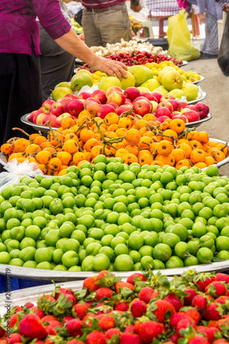 Buyers in the vegetable and fruit market