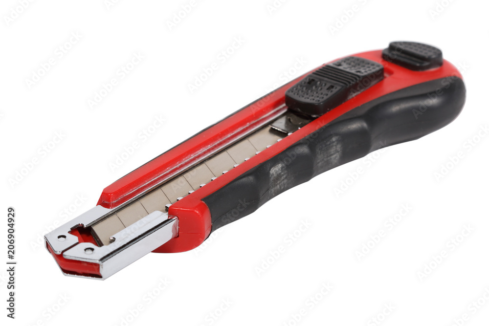 Old red utility knife with segmented blade Old red utility knife with segmented blade