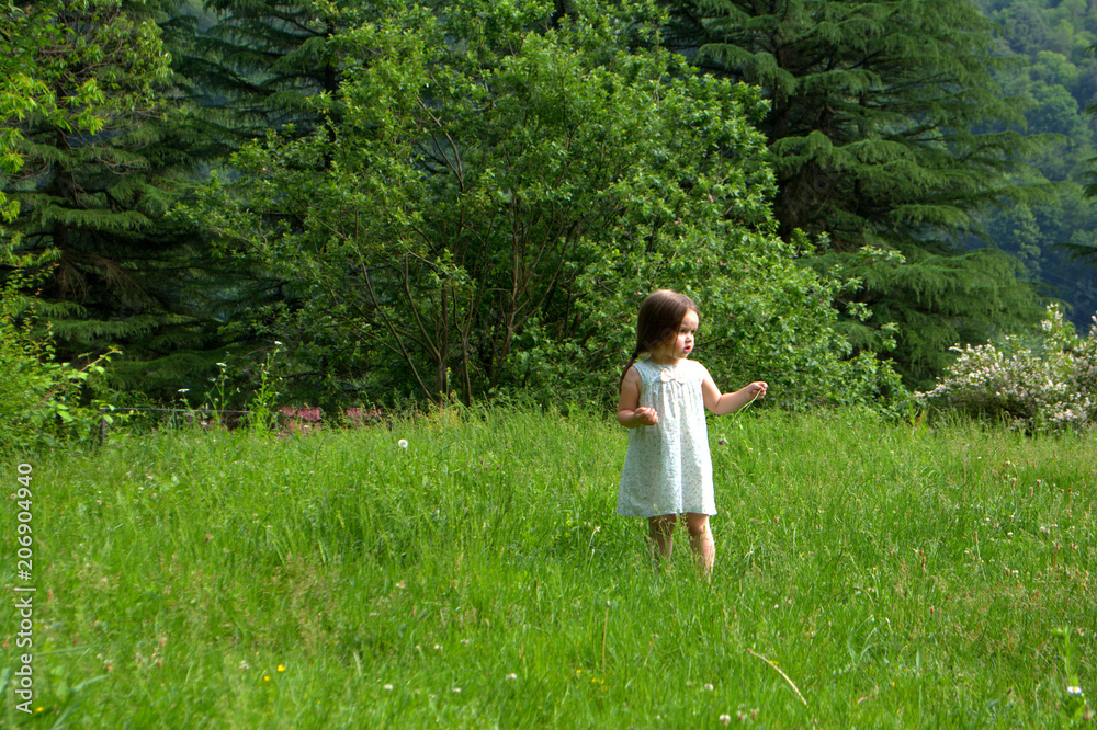 Little girl walking in the Park
